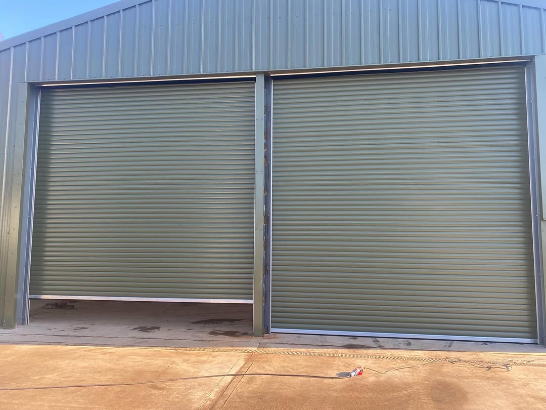 Two roller shutter doors on an industrial building